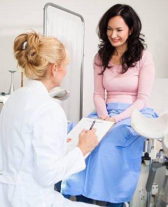 Healthcare professional speaking with a patient
